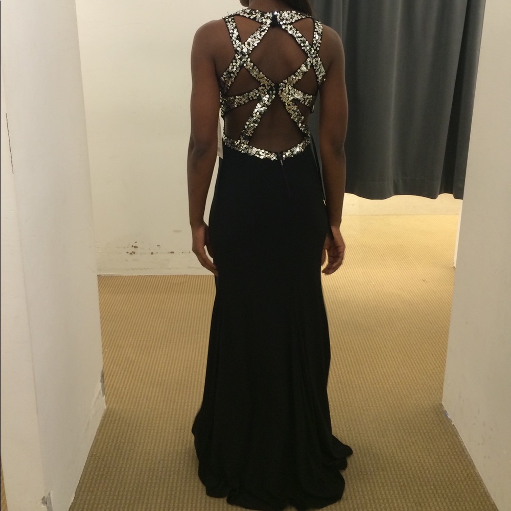 Black gown with sequins strap in the back